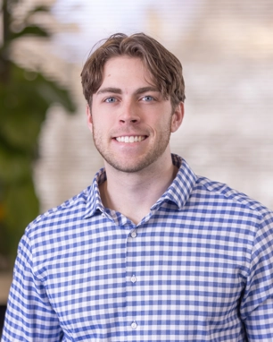 portrait of a smiling person in professional attire